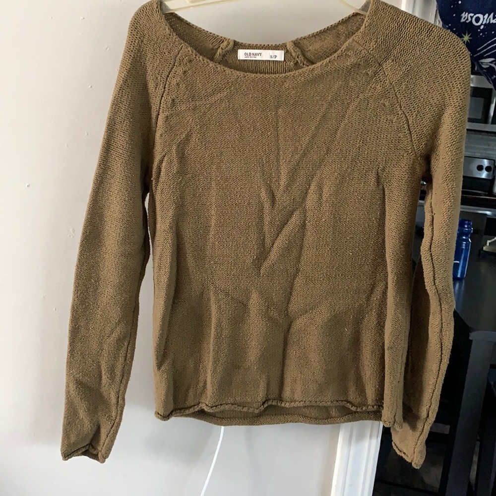 Three women’s sweaters